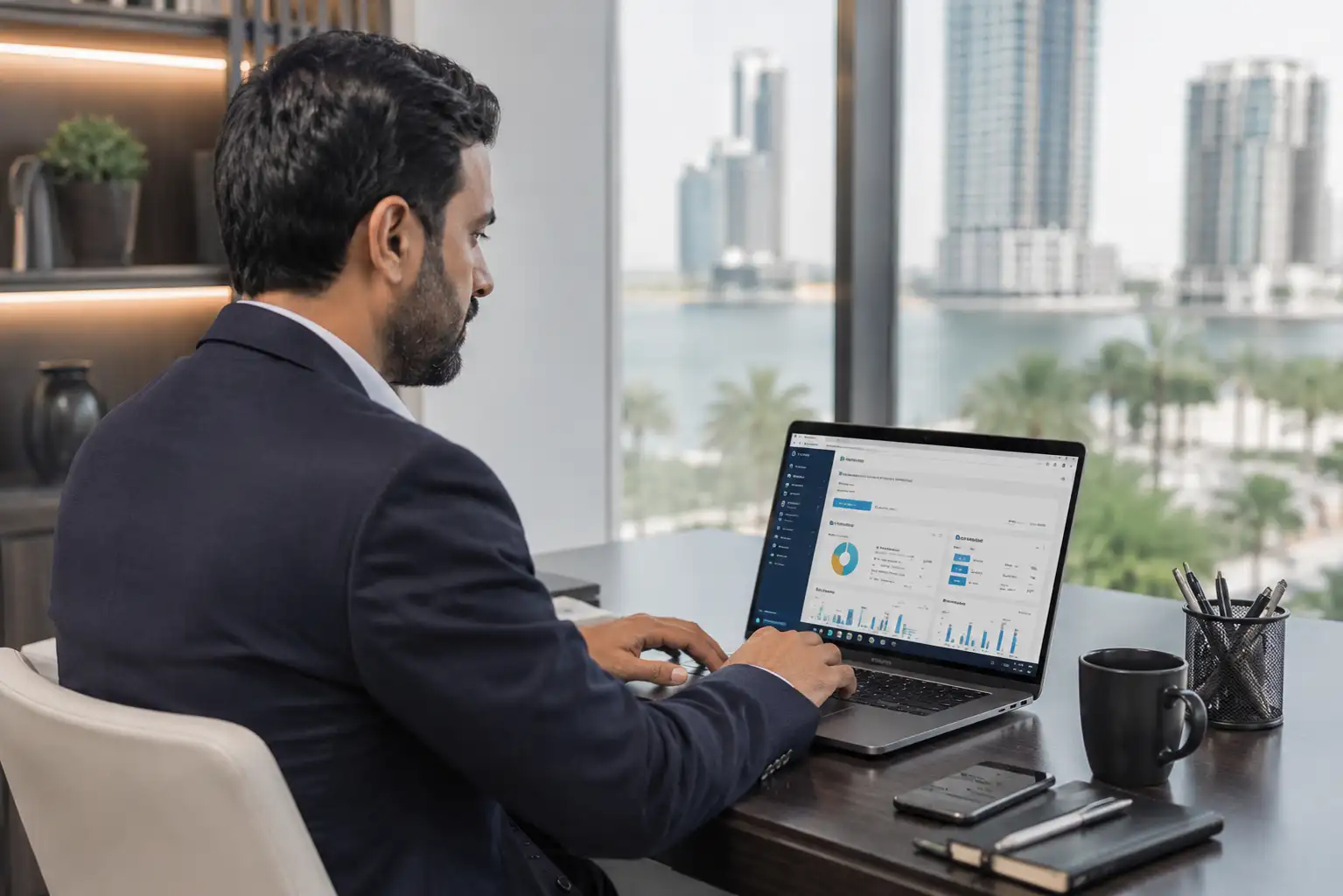 Entrepreneur accessing Ajman Media City Free Zone business login portal in UAE office